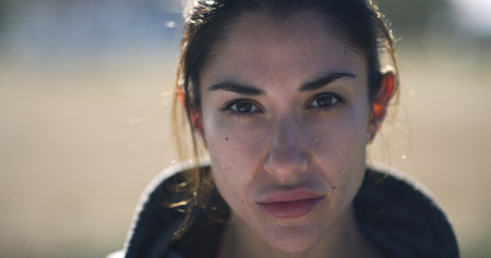 Serious, fitness and health with portrait of woman for workout break, running and marathon training. Ready, exercise and start with person and outdoor for wellness, sports and female runner.の写真素材