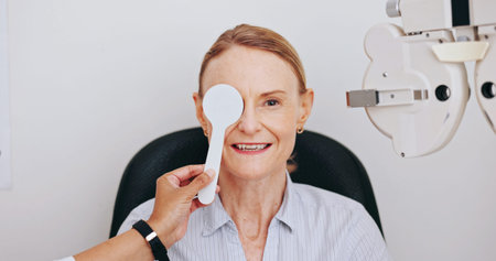 Hands, optometry and portrait of woman in eye exam for healthcare, smile and mature person with...