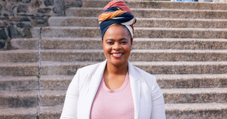 Portrait, smile and steps with business black woman outdoor in urban city for job opportunity....