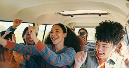 Excited, road trip and car with friends, dance and love for journey and countryside travel. Memory, laughing or happy people bonding for summer adventure, holiday break and vacation with van or groupの写真素材