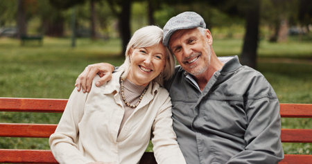 Mature couple, hug and portrait in park for bonding, conversation and commitment together outdoors....