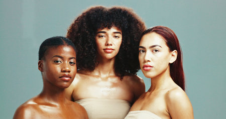 Women, diversity and portrait for skincare in studio background for inclusive beauty. Natural, people and eyes closed with glow in confidence with empowerment, body care and skin treatment or supportの写真素材