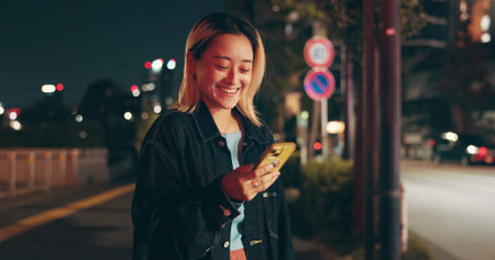 Night, waiting and woman at in city with phone, happy travel and checking online public transport...