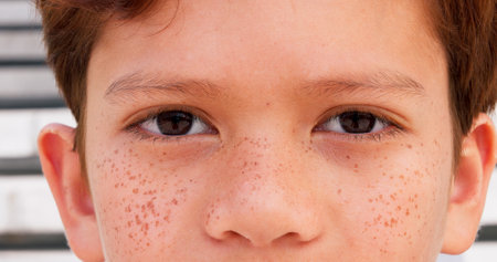 Optometry, closeup and eyes of kid for vision, optometry and eyesight improvement for healthcare. Ophthalmology, face and portrait of young boy child with optical wellness awareness for visual.の写真素材