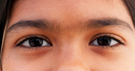 Optometry, closeup and eyes of child for optical, care and eyesight improvement for healthcare. Ophthalmology, face and portrait of young girl kid with vision wellness awareness for visual lens.の写真素材