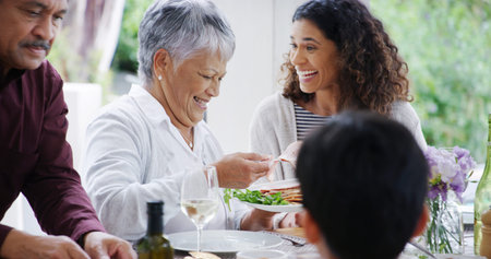 Thanksgiving, dinner and family with eating by home for bonding, festive celebration or social...