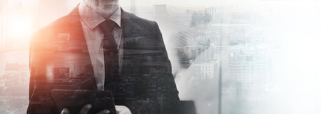Overlay, business and man with tablet, hands and lens flare with city, mockup space and internet. Person, accounting and financial advisor with double exposure, banner and tech with connection or appの写真素材