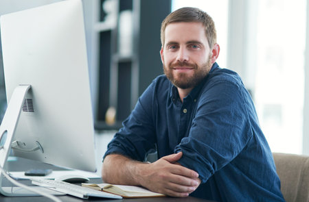 Computer, office and portrait of businessman at desk for online project, web design and research....