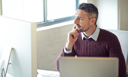 Office, businessman and thinking with research on monitor for information technology, server and...
