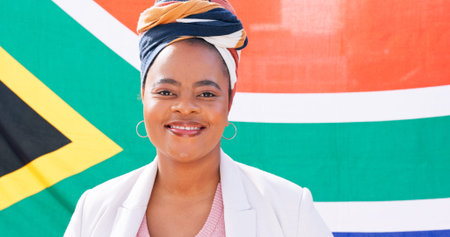 Portrait, black woman and South African flag with smile, national pride and patriotism for country....