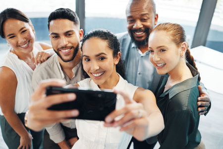 Selfie, meeting and group of friends, office and smile for collaboration, celebration and corporate. Happy, photography and people with profile picture for success, teamwork and creative in companyの写真素材