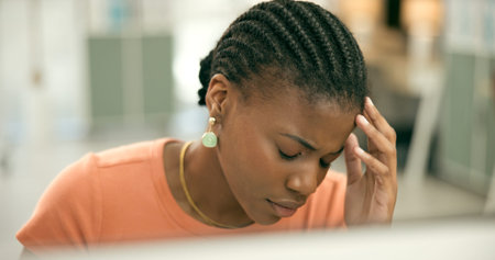 Office, computer or black woman with headache, stress or exhausted with fatigue, anxiety or...