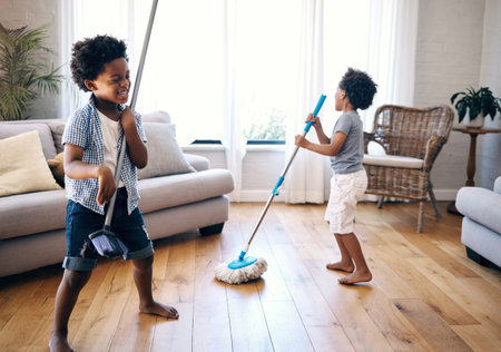 Home, mop and broom with children for singing, cleaning and fun activity for entertainment in...