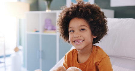 Happy boy, portrait and childcare with smile for health, care or wellness at hospital appointment....
