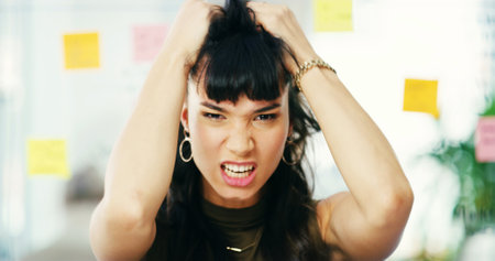 Woman, stress and planning fail in office portrait, anxiety and brainstorming burnout at work. Female person, creative professional and frustration with moodboard in agency, task crisis and disasterの写真素材