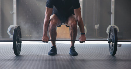 Barbell, hands and man in gym, training and exercise for health, challenge and workout. Person, athlete and bodybuilder in wellness center, equipment and energy with power, muscle and fitnessの写真素材