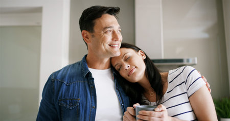Home, couple and tea with hug for bonding together, romantic moment and connection in marriage....
