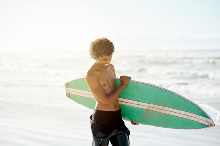 Surfing, man and happy at beach, sea and ocean for tropical holiday, summer vacation and mockup....