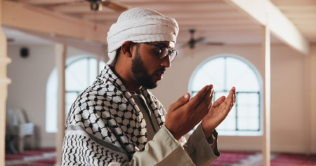 Religion, Muslim and man in Mosque for prayer, worship and faith in religious building. Spiritual,...