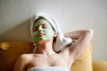 Skincare, rest and woman with face mask, luxury and salon treatment for beauty, dermatology and facial. Cosmetics, female and lady with grooming, wellness and body care for smooth, zen and soft skinの写真素材