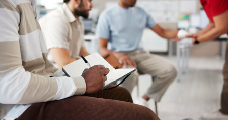 Hands, first aid and writing for training, emergency and bandage for learning in workplace. Person,...
