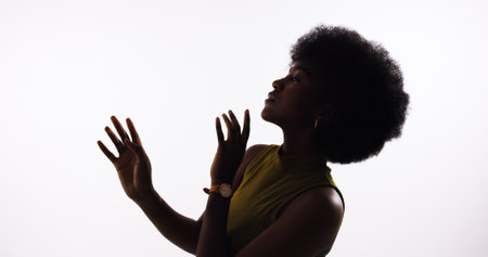 Black woman, fashion and art deco style in studio, creative elegance and white background. Female person, designer outfit and confidence in clothes for aesthetic, wardrobe recreation and proud trendの写真素材