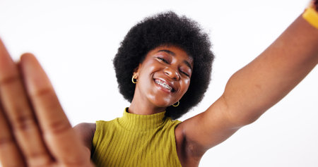 Hand frame, portrait and black woman in studio for profile picture, memory or selfie for fashion. Happy, capture and African content creator with photography for social media by white background.の写真素材