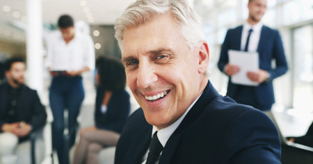 Happy, collaboration and portrait of mature businessman in office for negotiation on real estate law...
