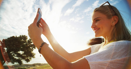 Woman, selfie and happy on road trip for social media, journey update and travel blog. Influencer,...