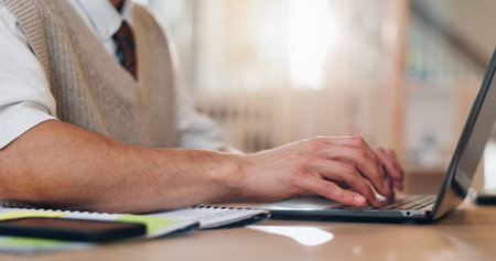 Man, hands and typing on laptop for business, article research and email communication in office....