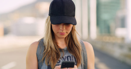 Typing, smartphone and woman in city, travel and message to contact, texting and social media....
