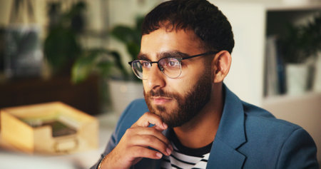 Thinking, planning and idea with business man in office for art critic, blog article inspiration and reflection. Gallery opinion, writer and brainstorming review, person in media agency and visionの写真素材