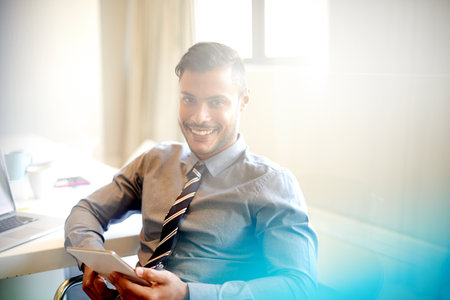 Businessman, tablet and feedback for legal case, defense proposal and corporate lawyer in office. Attorney, portrait and laptop for consultant, advocate report and online research review for internetの写真素材