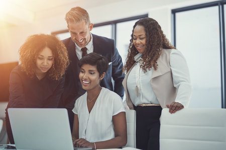 Laptop, finance or business people in meeting with project for feedback, discussion or teamwork. Corporate report, happy or financial advisor talking to economists for economy or planning togetherの写真素材