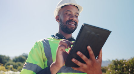 Outdoor, business and black man with tablet for construction, project development and research....