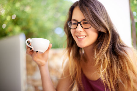 Journalist, thinking and cafe with coffee shop, laptop and writing for blog or article. Woman, idea and technology for remote work, planning proposal and research for copywriting or freelance careerの写真素材