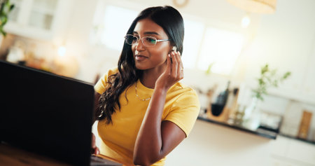 Remote work from home, earphones and woman with laptop and listening to music, audio and radio....