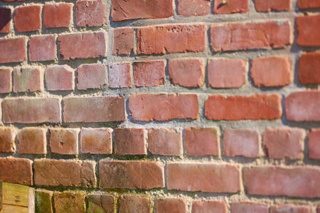 Brick wall, property and empty with architecture on background with masonry, outdoor and exterior with pattern. City, texture and concrete for real estate, building and urban housing in Colombiaの写真素材