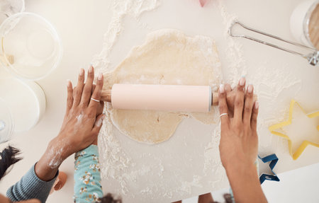 Baking, dough and hands of parents and child in kitchen to prepare cake, cookies and dessert....