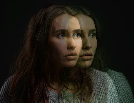 Mental health, woman and face in studio with double exposure, fear and bipolar disorder. Patient,...