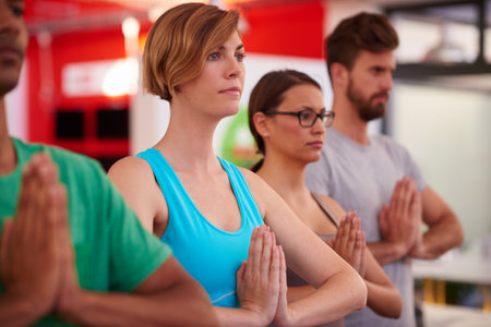Prayer hands, wellness or people in yoga class for chakra energy, mental therapy and inner peace....