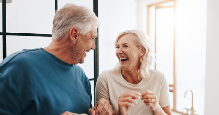 Clean, couple and floss in home, routine and string for prevention of cavity, laughing or grooming. House, elderly people and thread for oral health in bathroom, happy and together with dental careの写真素材
