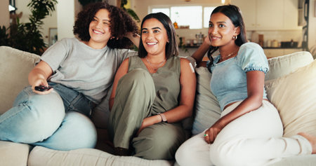 Woman, friends and smile watching tv, movies and bonding in living room with remote. People, reunion...