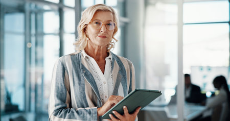 Portrait, business and woman in office, tablet and internet with connection, urban planner or confidence. Mature person, employee or consultant in workplace, city development or tech with digital appの写真素材