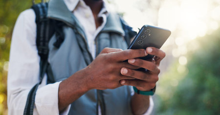 Nature, hands and person with phone for hiking, typing location or social media on adventure....