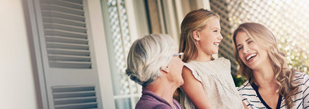 Women, family and generations outdoor with mother, grandmother and child together on patio....