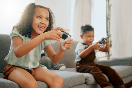 Happy, controllers and children on sofa with video game for bonding, weekend and relax in home....