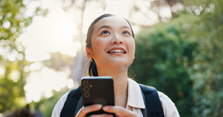 Travel, thinking and woman with smartphone, nature and student with notification of funding or...