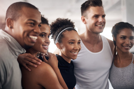 Exercise, hug and team building with people in gym together for solidarity, support or training....
