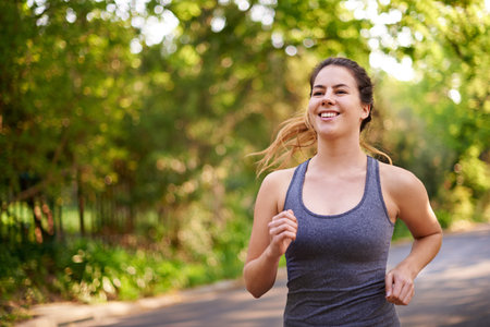 Running, fitness and woman with cardio, wellness and nature with challenge, sports and endurance....
